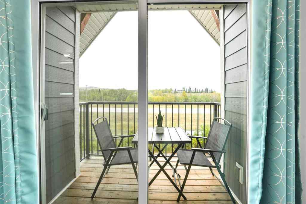 MLS® A2258679 - 44 Cottageclub Lane  in Cottage Club at Ghost Lake Rural Rocky View County, Residential
