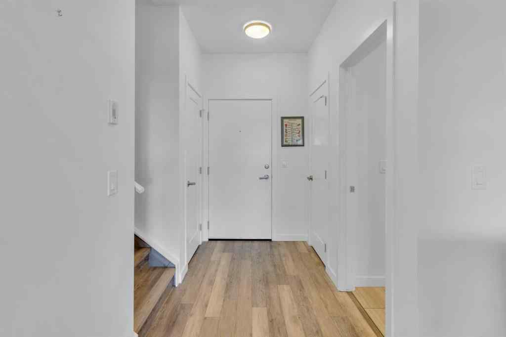 MLS® A2258699 - Unit #101 8531 8A Avenue SW in West Springs Calgary, Residential
