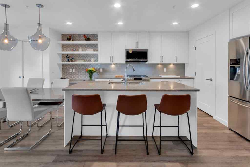 MLS® A2258699 - Unit #101 8531 8A Avenue SW in West Springs Calgary, Residential