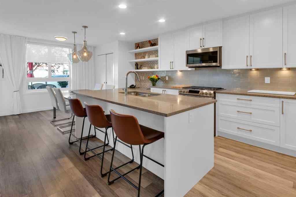 MLS® A2258699 - Unit #101 8531 8A Avenue SW in West Springs Calgary, Residential