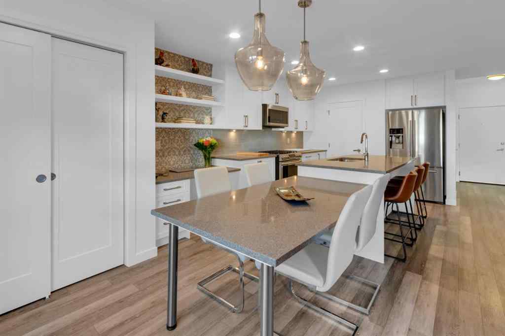 MLS® A2258699 - Unit #101 8531 8A Avenue SW in West Springs Calgary, Residential