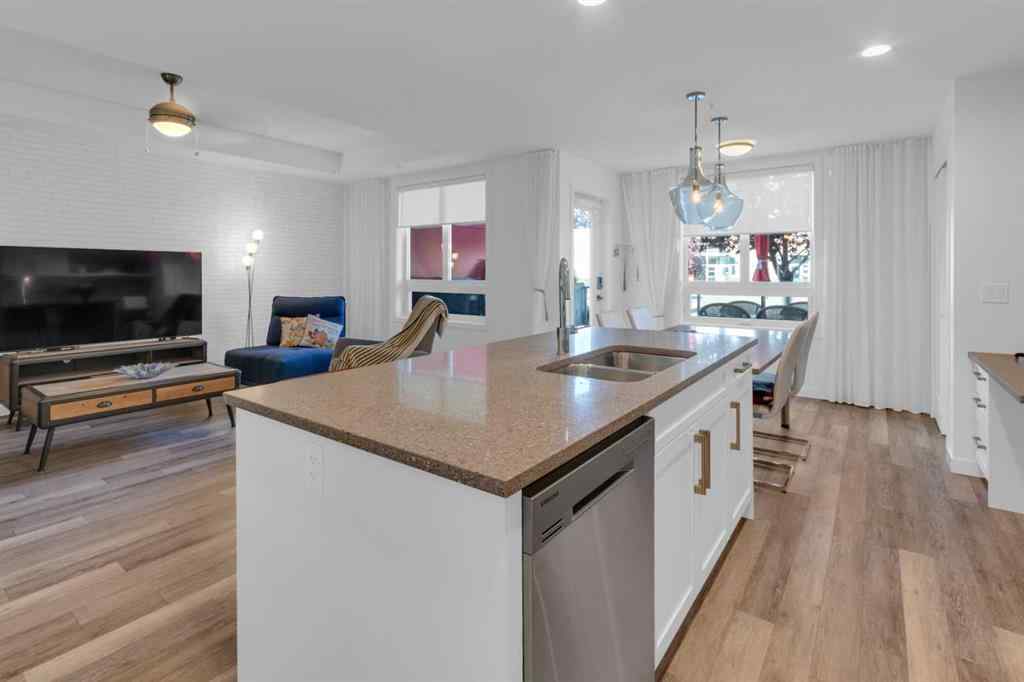 MLS® A2258699 - Unit #101 8531 8A Avenue SW in West Springs Calgary, Residential
