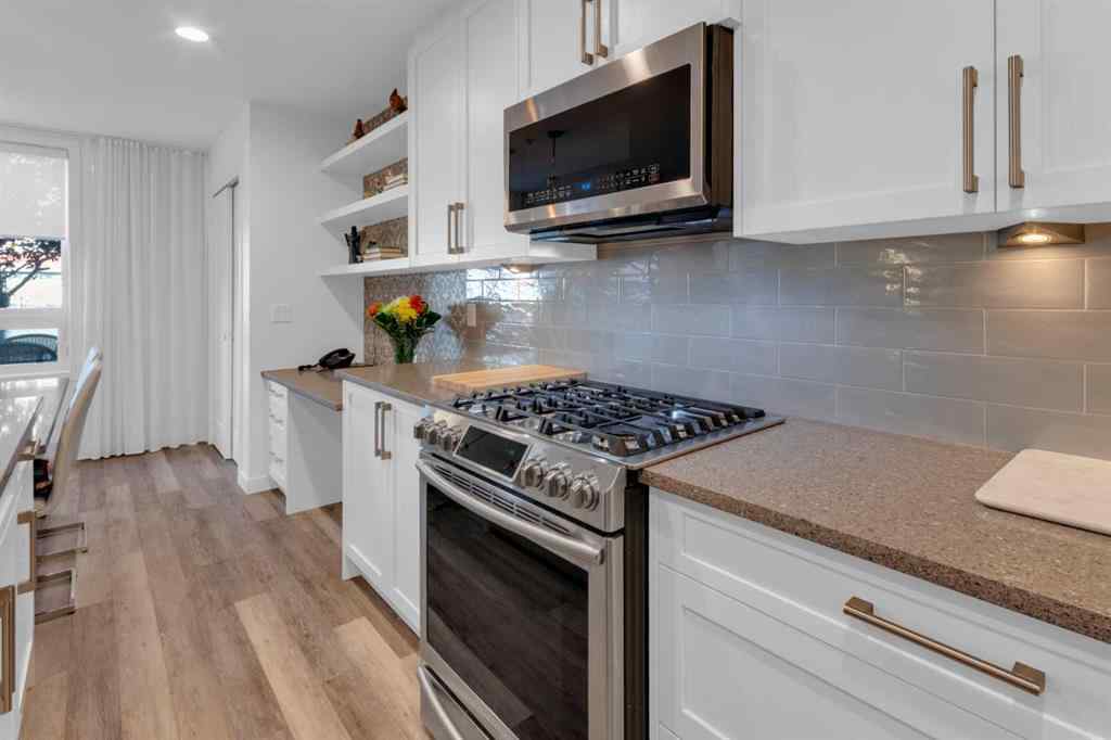 MLS® A2258699 - Unit #101 8531 8A Avenue SW in West Springs Calgary, Residential