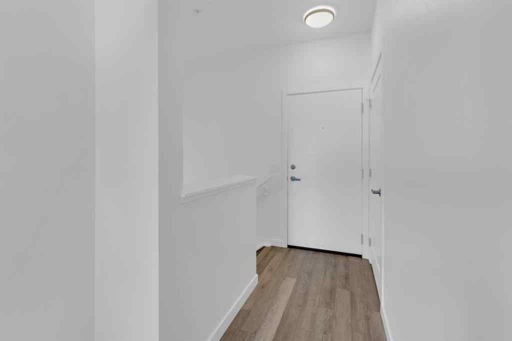MLS® A2258699 - Unit #101 8531 8A Avenue SW in West Springs Calgary, Residential