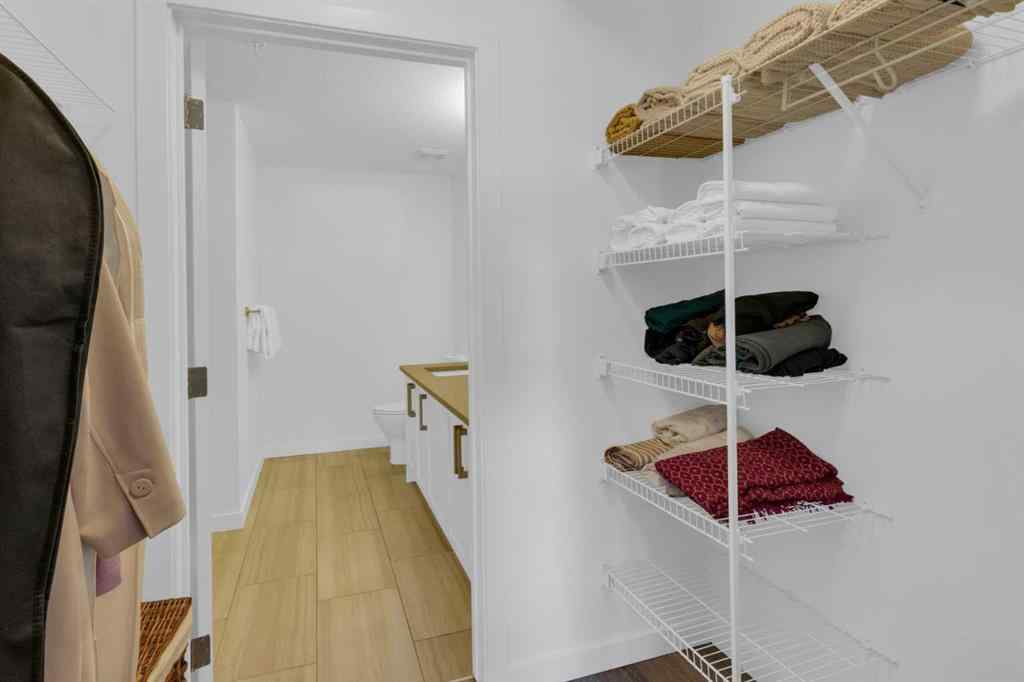 MLS® A2258699 - Unit #101 8531 8A Avenue SW in West Springs Calgary, Residential