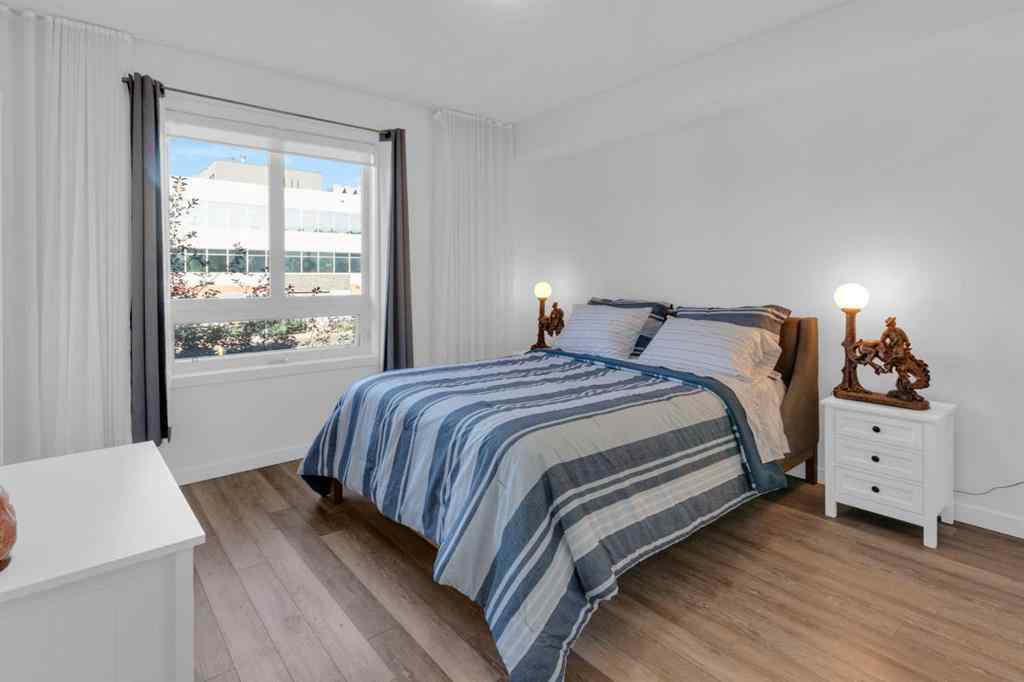 MLS® A2258699 - Unit #101 8531 8A Avenue SW in West Springs Calgary, Residential