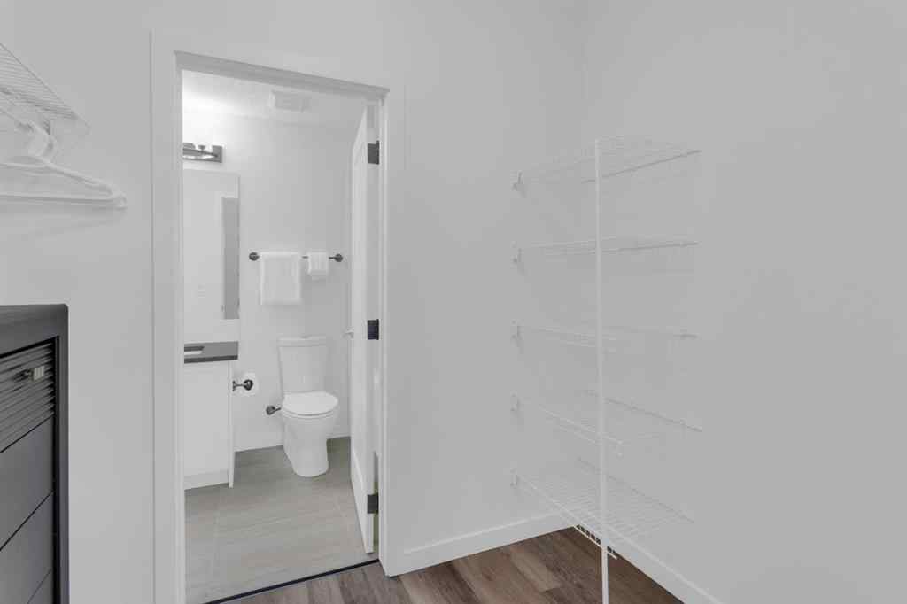 MLS® A2258699 - Unit #101 8531 8A Avenue SW in West Springs Calgary, Residential