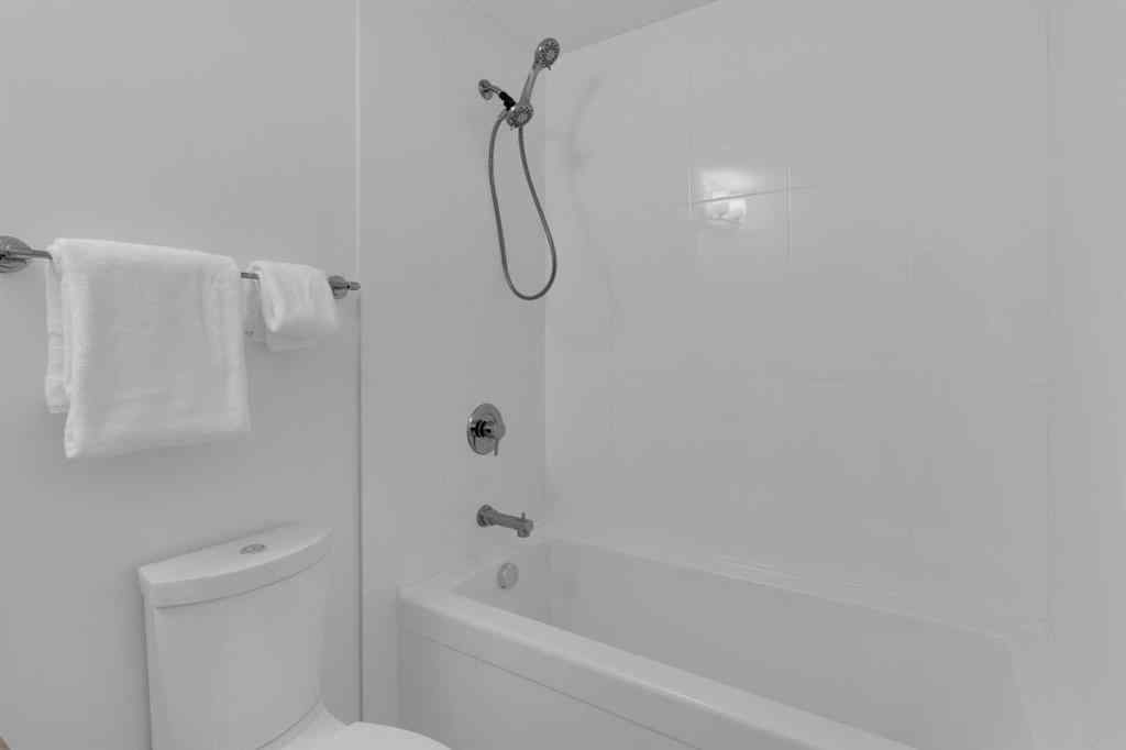 MLS® A2258699 - Unit #101 8531 8A Avenue SW in West Springs Calgary, Residential
