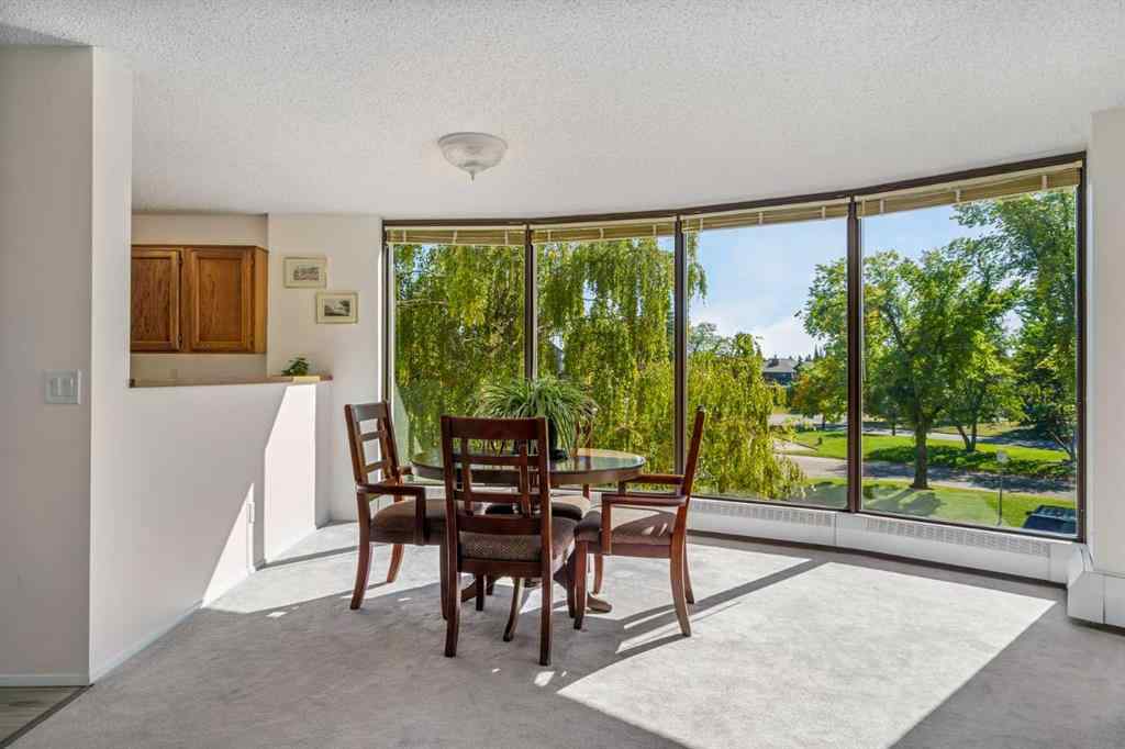 MLS® A2258710 - Unit #221 20 Coachway Road SW in Coach Hill Calgary, Residential