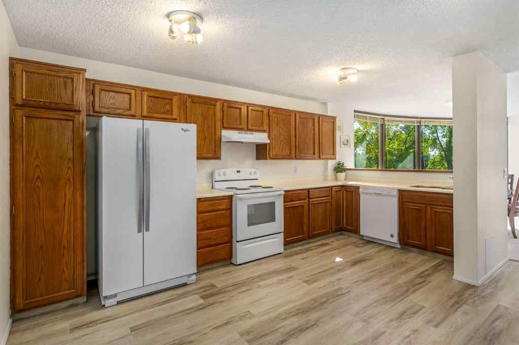 MLS® A2258710 - Unit #221 20 Coachway Road SW in Coach Hill Calgary, Residential