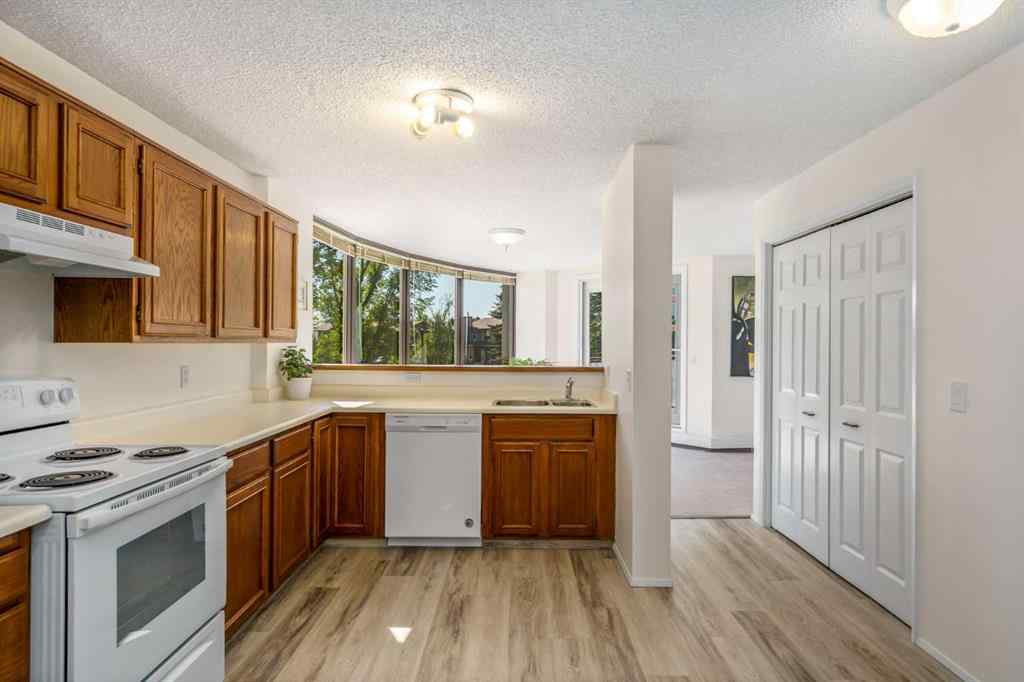 MLS® A2258710 - Unit #221 20 Coachway Road SW in Coach Hill Calgary, Residential