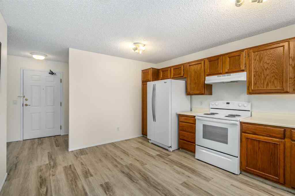 MLS® A2258710 - Unit #221 20 Coachway Road SW in Coach Hill Calgary, Residential