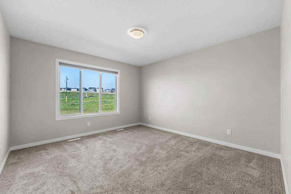 MLS® A2258725 - 166 Carringsby Way NW in Carrington Calgary, Residential