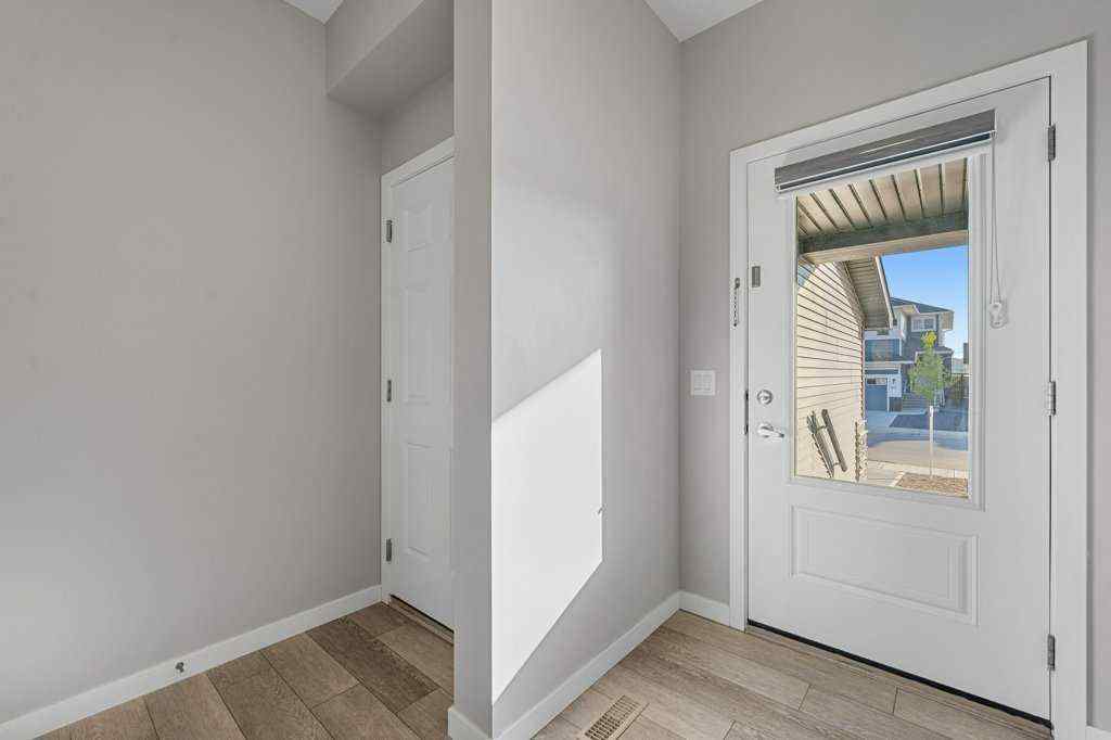 MLS® A2258725 - 166 Carringsby Way NW in Carrington Calgary, Residential