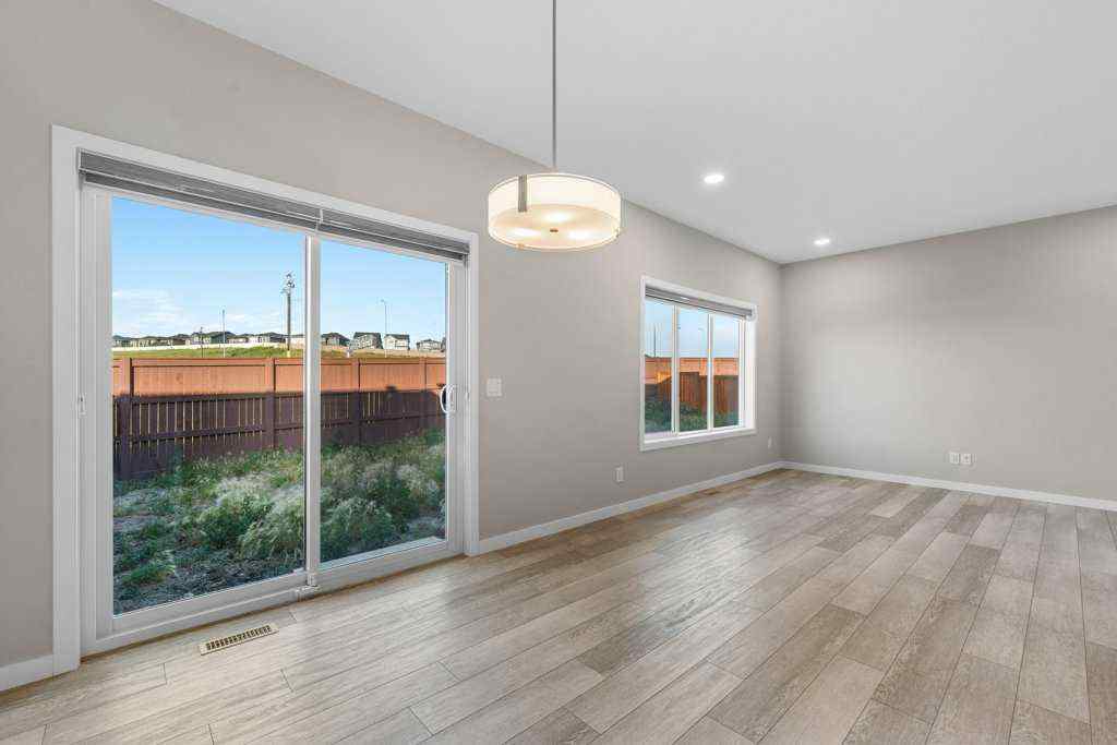 MLS® A2258725 - 166 Carringsby Way NW in Carrington Calgary, Residential