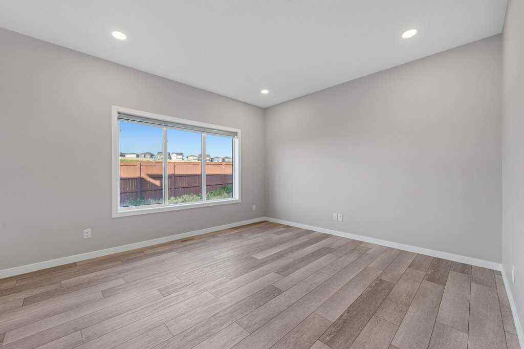 MLS® A2258725 - 166 Carringsby Way NW in Carrington Calgary, Residential