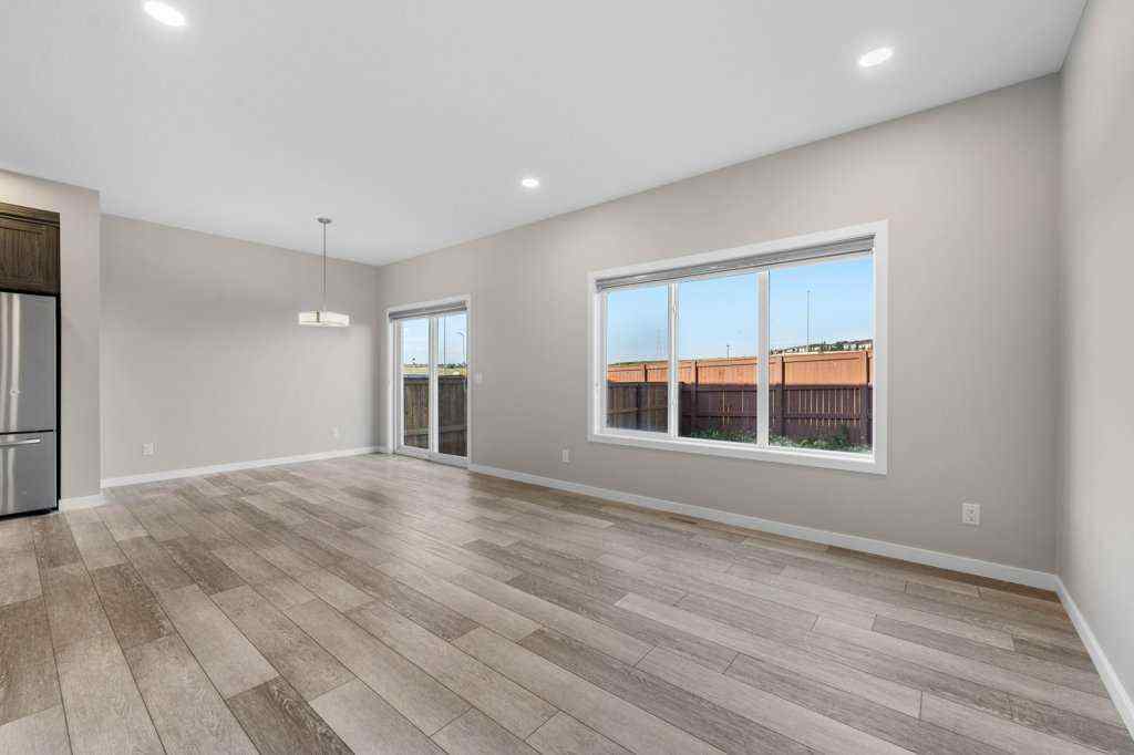 MLS® A2258725 - 166 Carringsby Way NW in Carrington Calgary, Residential