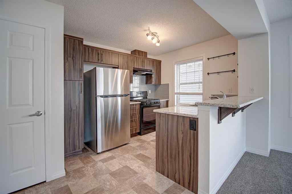 MLS® A2258738 - 221 Hillcrest Gardens SW in Hillcrest Airdrie, Residential