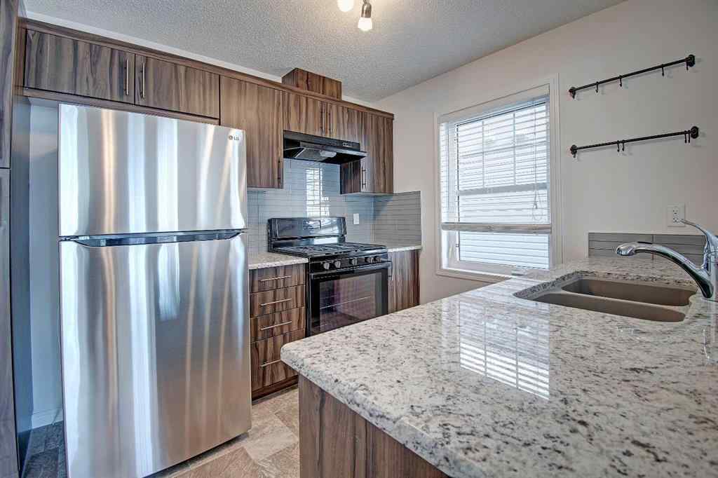 MLS® A2258738 - 221 Hillcrest Gardens SW in Hillcrest Airdrie, Residential