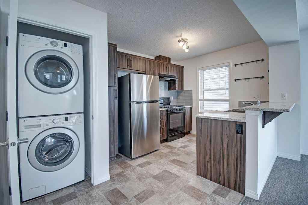 MLS® A2258738 - 221 Hillcrest Gardens SW in Hillcrest Airdrie, Residential