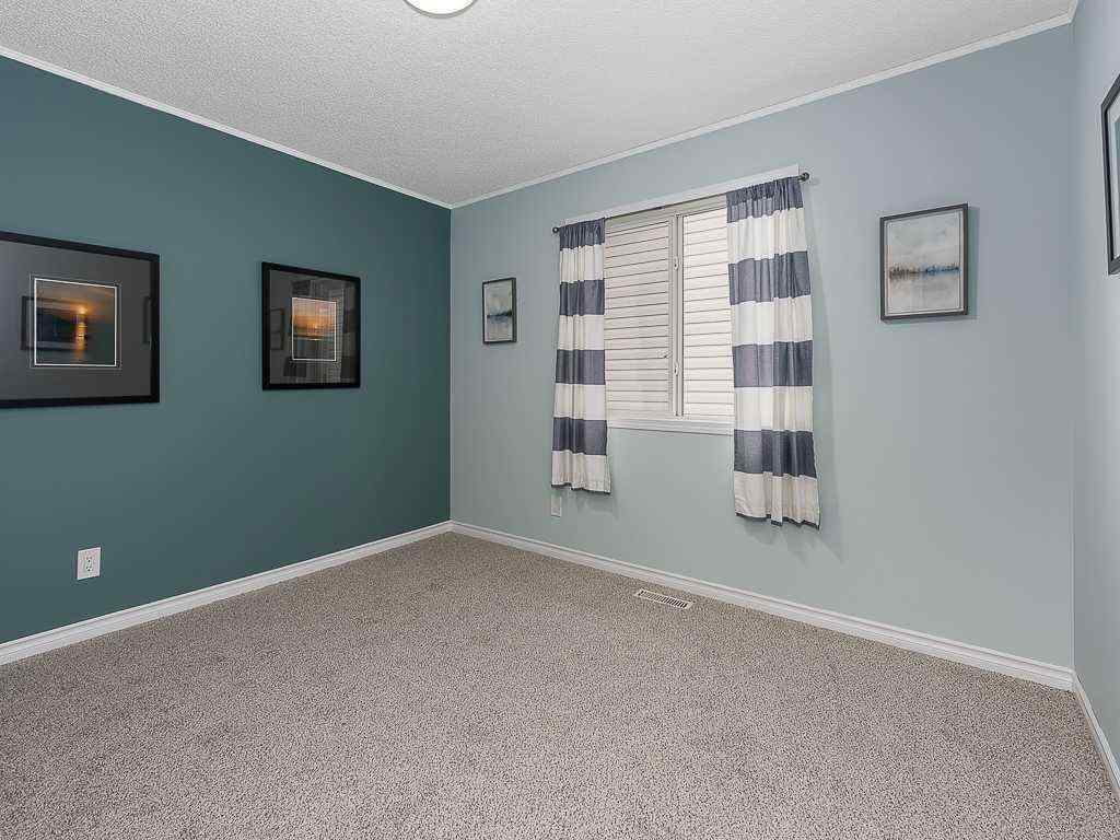 MLS® A2258747 - 323 Bridlewood Circle SW in Bridlewood Calgary, Residential