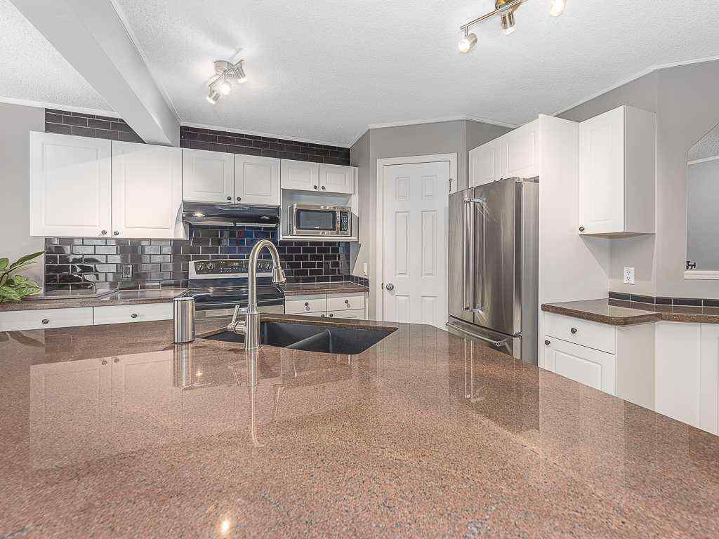 MLS® A2258747 - 323 Bridlewood Circle SW in Bridlewood Calgary, Residential