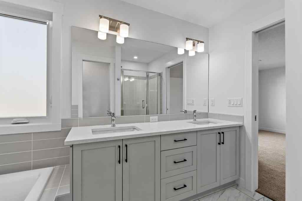 MLS® A2258763 - 22 Emerson Crescent  in Wedderburn Okotoks, Residential