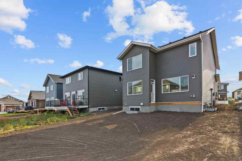 MLS® A2258763 - 22 Emerson Crescent  in Wedderburn Okotoks, Residential