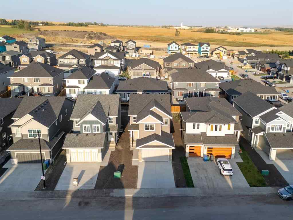 MLS® A2258763 - 22 Emerson Crescent  in Wedderburn Okotoks, Residential