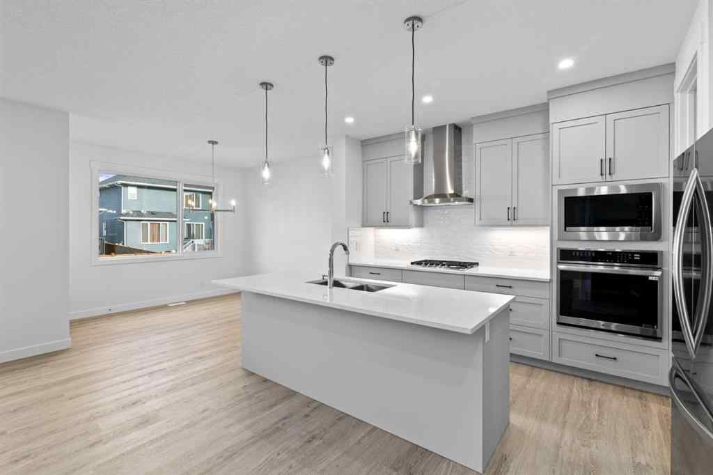 MLS® A2258763 - 22 Emerson Crescent  in Wedderburn Okotoks, Residential