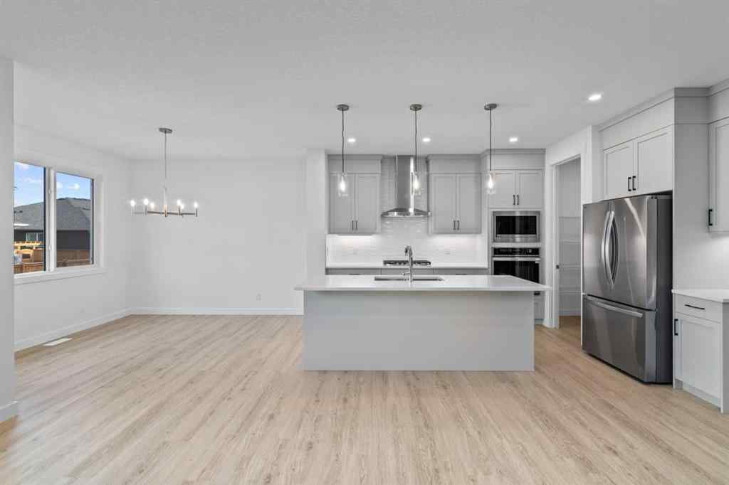 MLS® A2258763 - 22 Emerson Crescent  in Wedderburn Okotoks, Residential