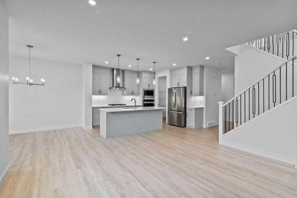 MLS® A2258763 - 22 Emerson Crescent  in Wedderburn Okotoks, Residential