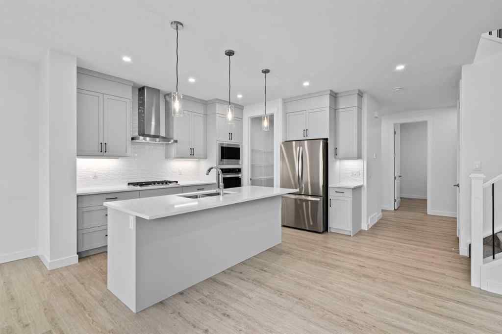 MLS® A2258763 - 22 Emerson Crescent  in Wedderburn Okotoks, Residential
