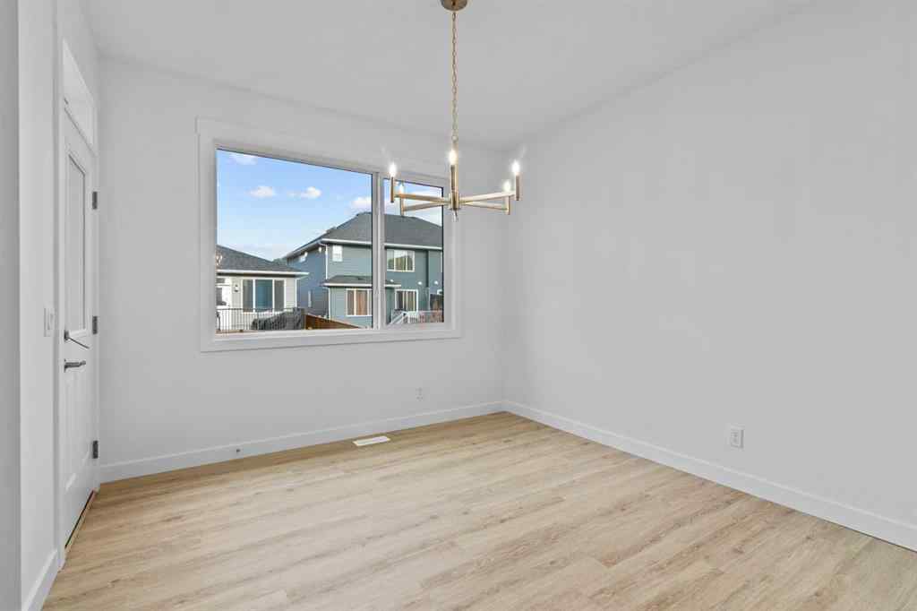 MLS® A2258763 - 22 Emerson Crescent  in Wedderburn Okotoks, Residential