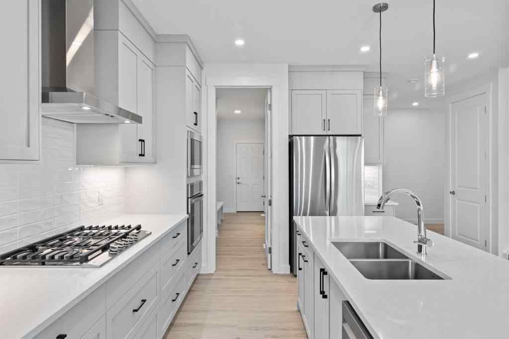 MLS® A2258763 - 22 Emerson Crescent  in Wedderburn Okotoks, Residential