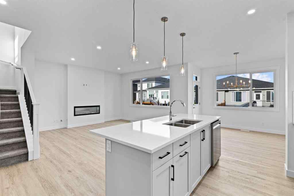 MLS® A2258763 - 22 Emerson Crescent  in Wedderburn Okotoks, Residential
