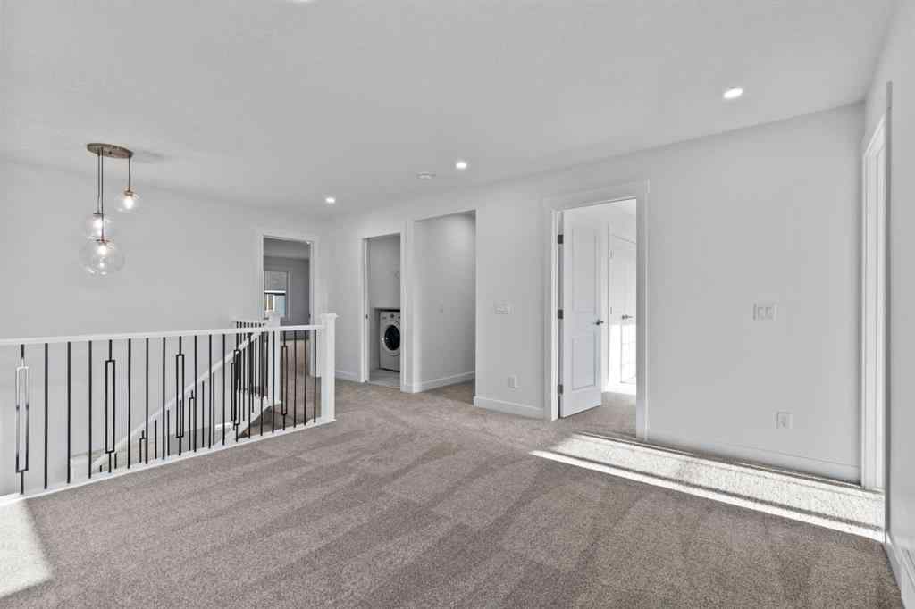 MLS® A2258763 - 22 Emerson Crescent  in Wedderburn Okotoks, Residential