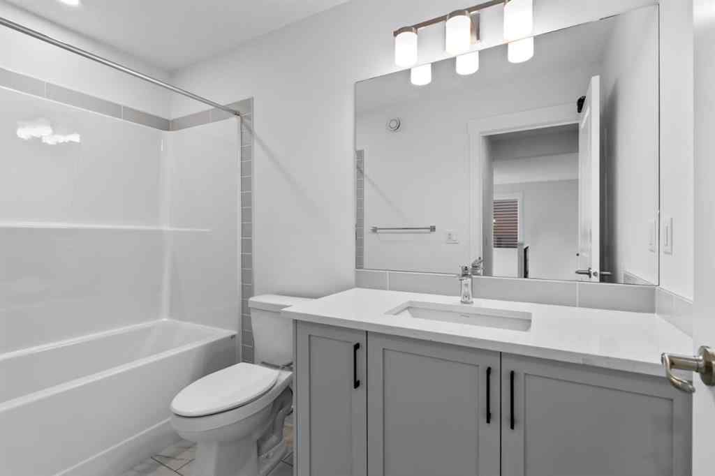 MLS® A2258763 - 22 Emerson Crescent  in Wedderburn Okotoks, Residential
