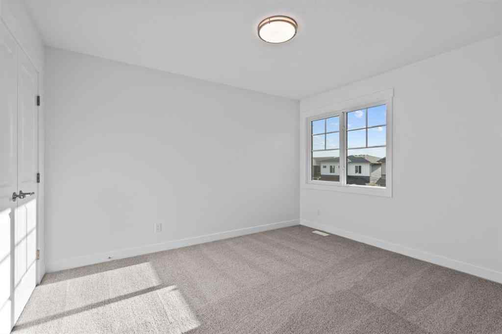 MLS® A2258763 - 22 Emerson Crescent  in Wedderburn Okotoks, Residential