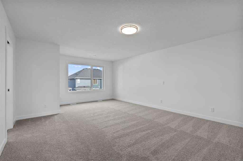 MLS® A2258763 - 22 Emerson Crescent  in Wedderburn Okotoks, Residential