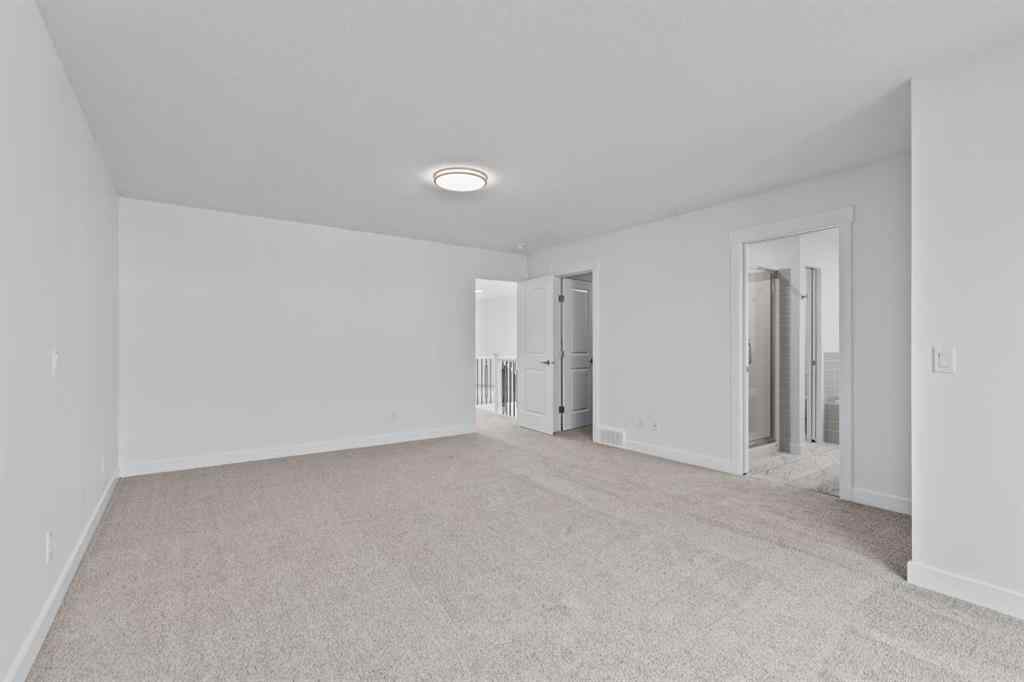 MLS® A2258763 - 22 Emerson Crescent  in Wedderburn Okotoks, Residential