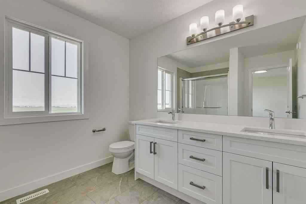 MLS® A2258787 - 17 Andalusian Road  in Heartland Cochrane, Residential