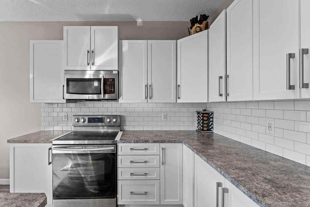 MLS® A2258790 - 59 Howse Manor NE in Livingston Calgary, Residential