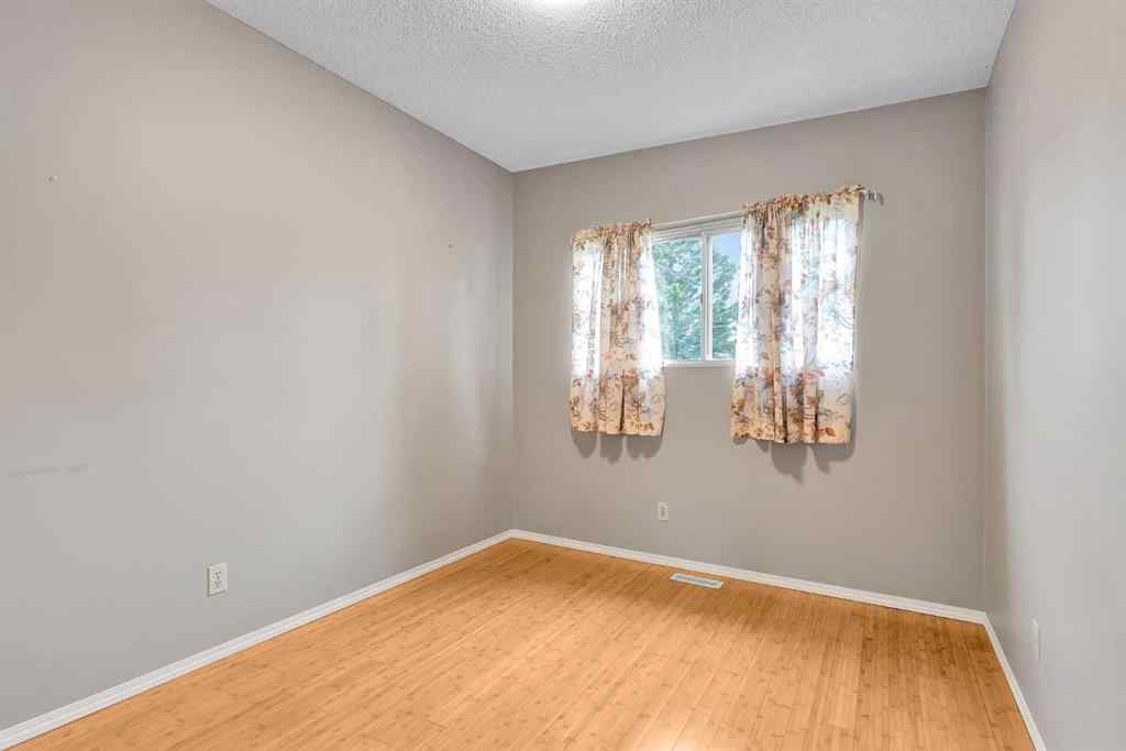 MLS® A2258797 - 10829 5 Street SW in Southwood Calgary, Residential