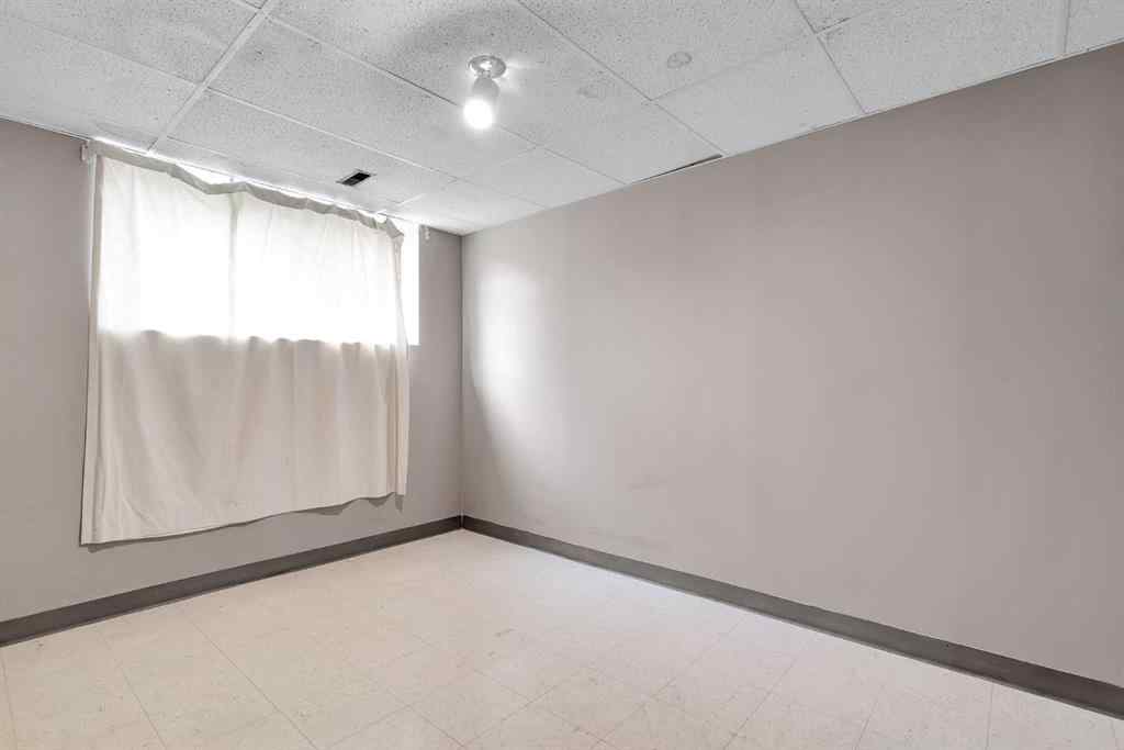 MLS® A2258797 - 10829 5 Street SW in Southwood Calgary, Residential