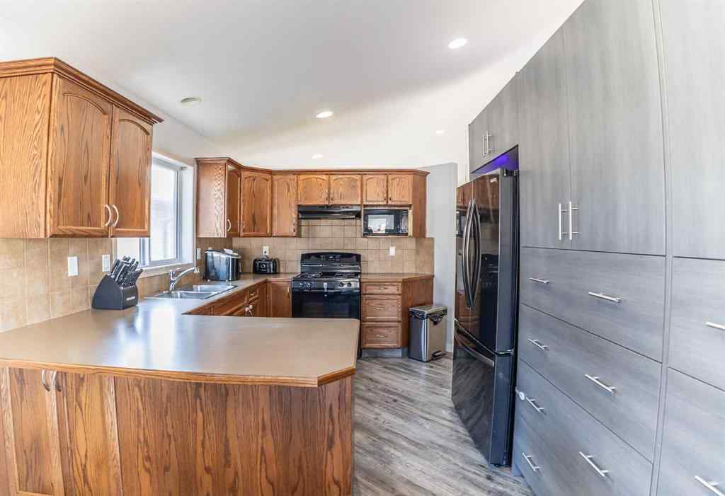 MLS® A2258803 - 205 Jennings Crescent  in Johnstone Crossing Red Deer, Residential