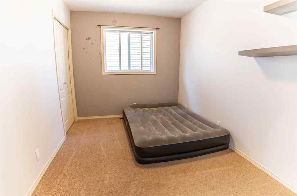 MLS® A2258803 - 205 Jennings Crescent  in Johnstone Crossing Red Deer, Residential
