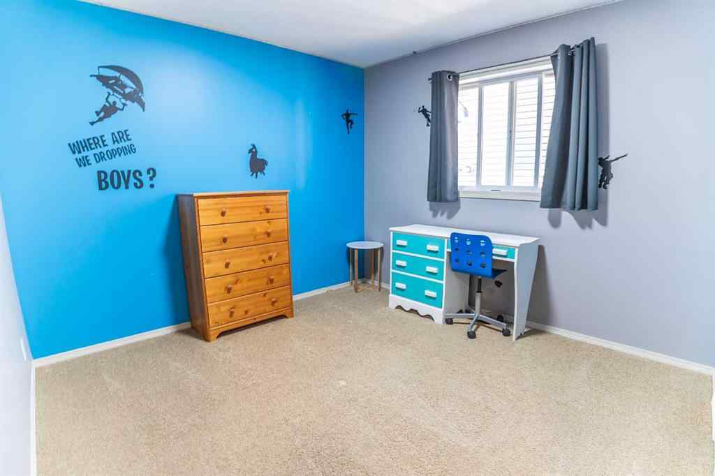 MLS® A2258803 - 205 Jennings Crescent  in Johnstone Crossing Red Deer, Residential