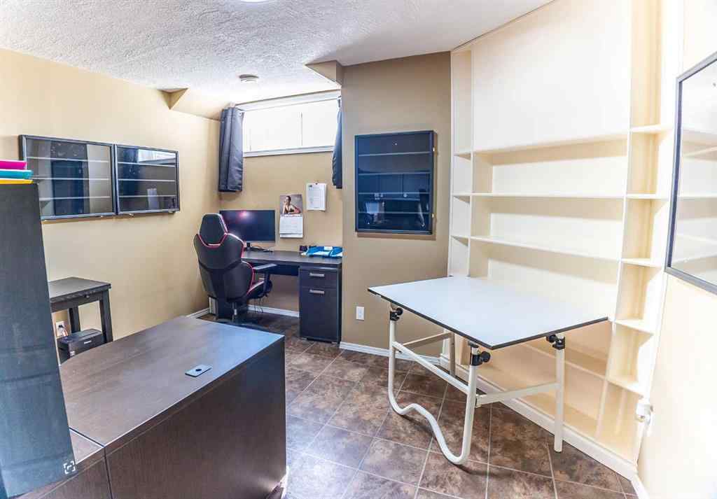 MLS® A2258803 - 205 Jennings Crescent  in Johnstone Crossing Red Deer, Residential