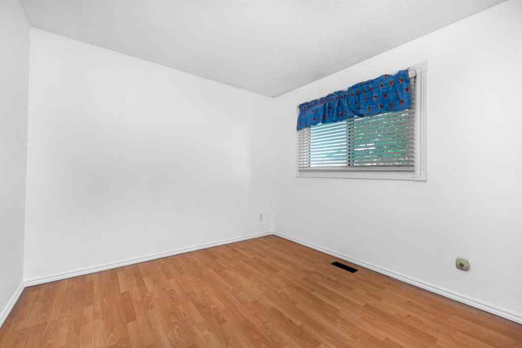 MLS® A2258804 - 207 Fallswater Road NE in Falconridge Calgary, Residential
